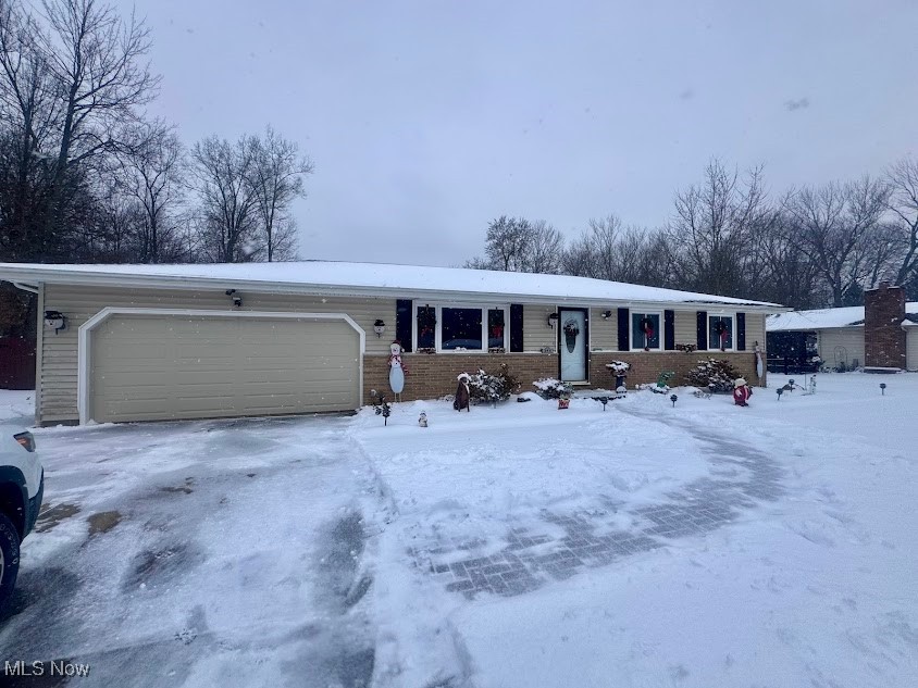 240 Spring Creek Road Northfield, OH 44067 - Photo 1 of 39 Ranch-style house with a garage