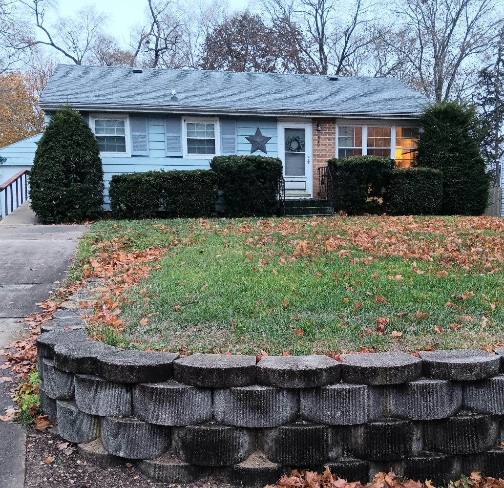 860 Franklin Grove Road Dixon, IL 61021 - Photo 1 of 9 a front view of a house with a yard