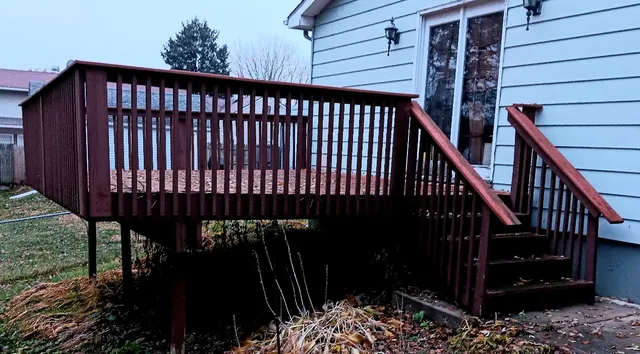 a view of balcony with wooden floor