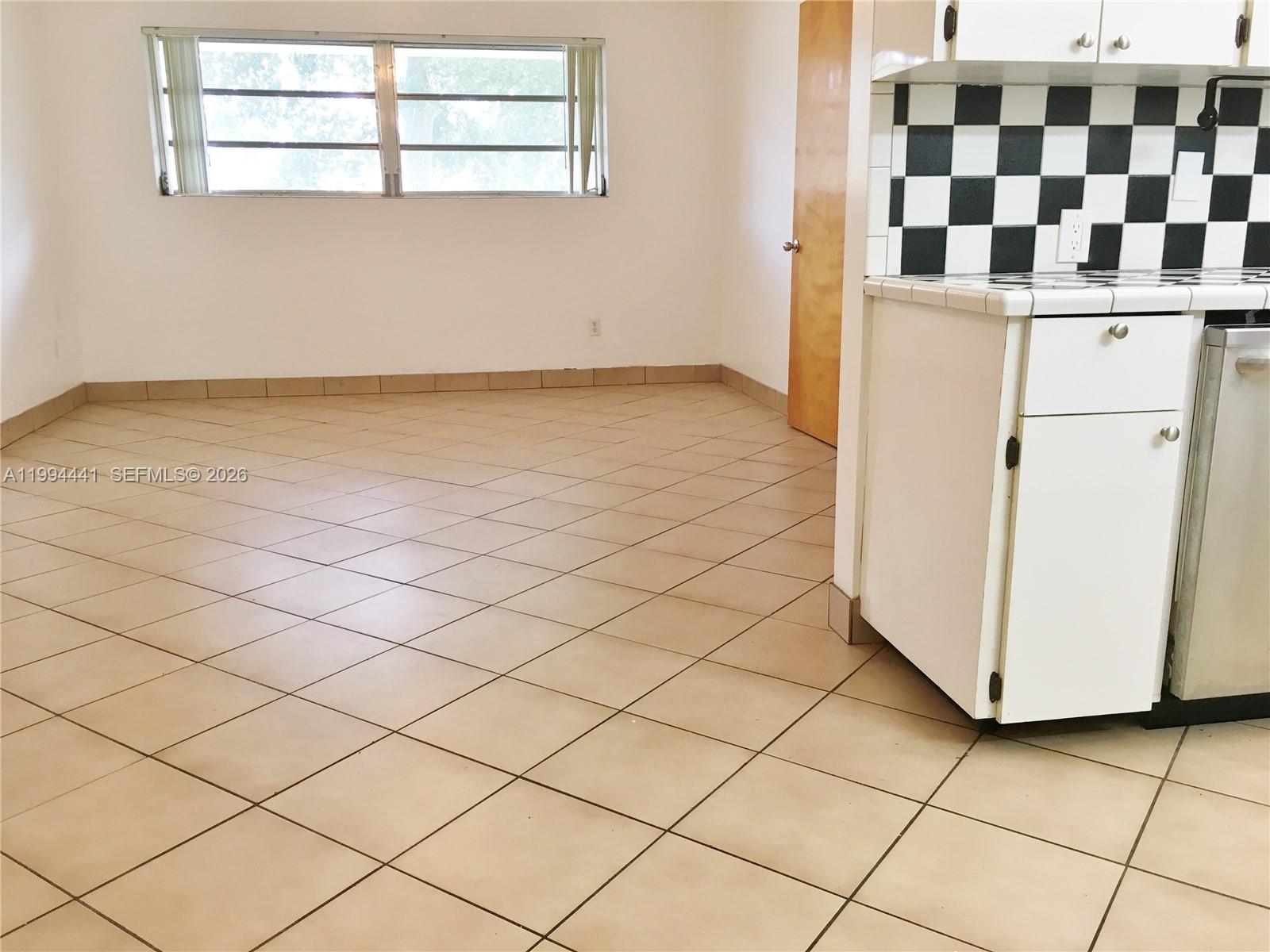 5831 Southwest 62nd Street, Unit WEST Miami, FL 33143 - Photo 7 of 16 a view of utility room