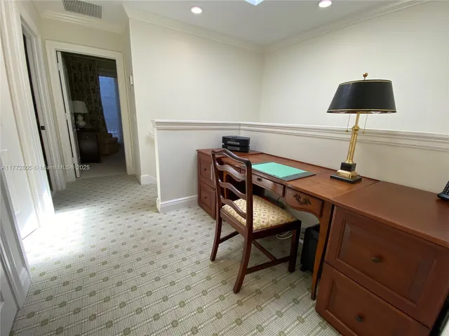 a room with furniture and a chandelier
