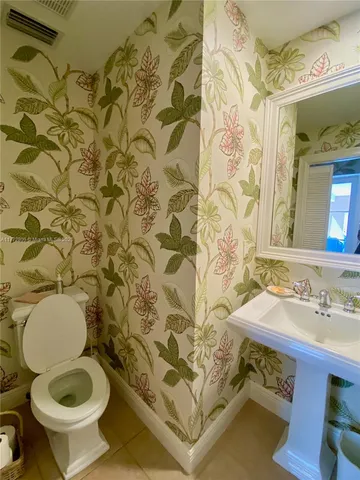 a bathroom with a sink and a toilet