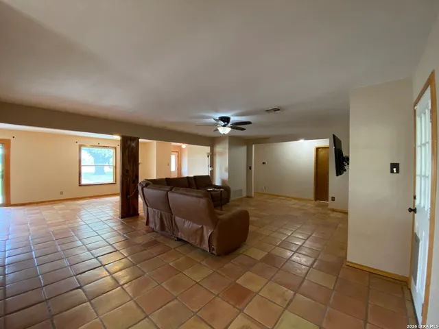 a view of an empty room and window