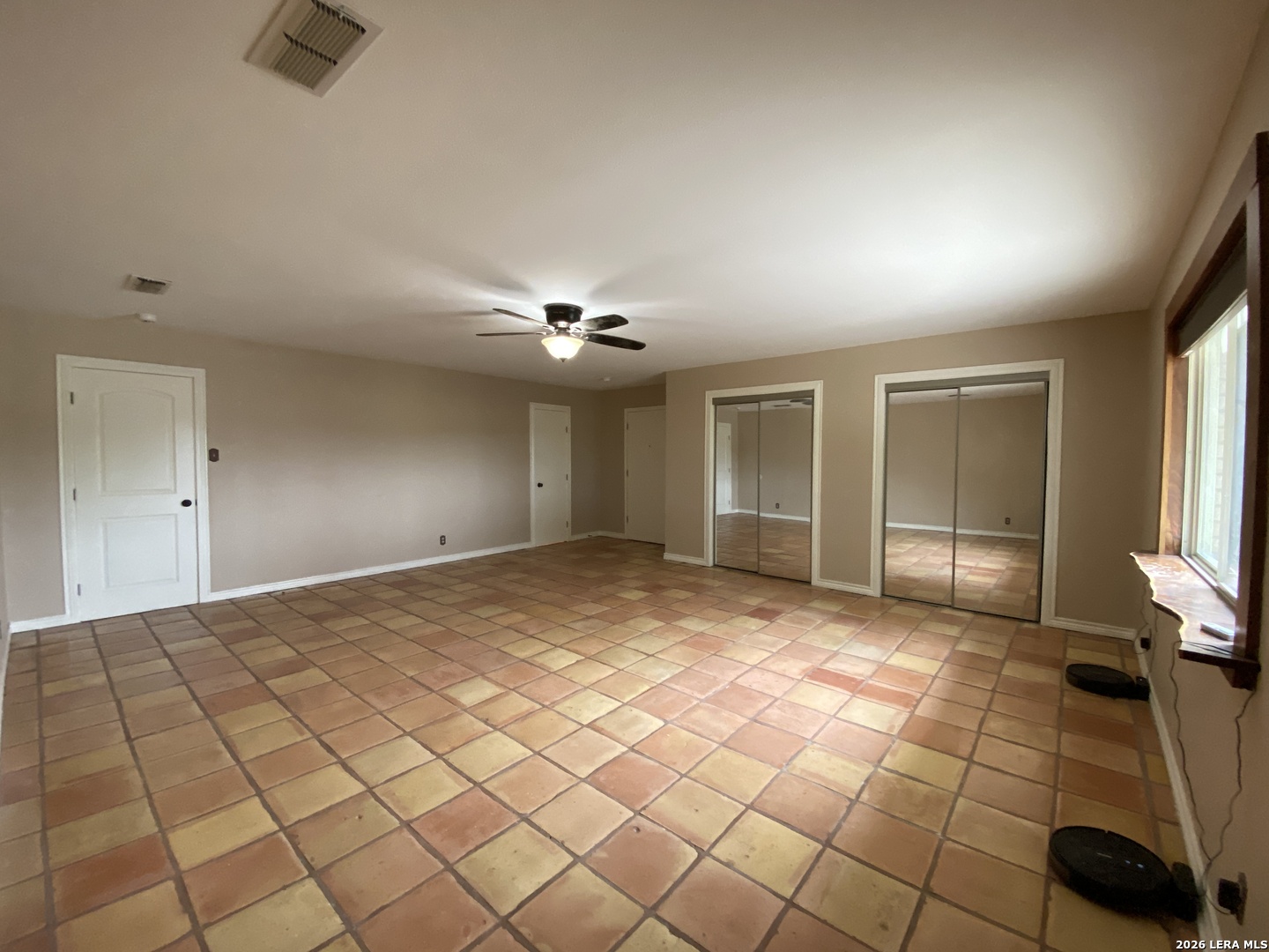60 Wisdom Road Pleasanton, TX 78064 - Photo 29 of 29 a view of an empty room and window