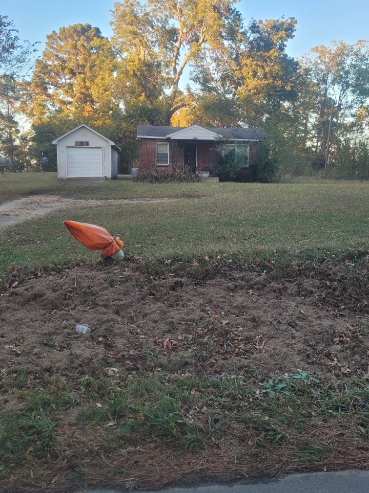 12586 Macon Road Collierville, TN 38017 - Photo 2 of 7 a front view of a house with a yard