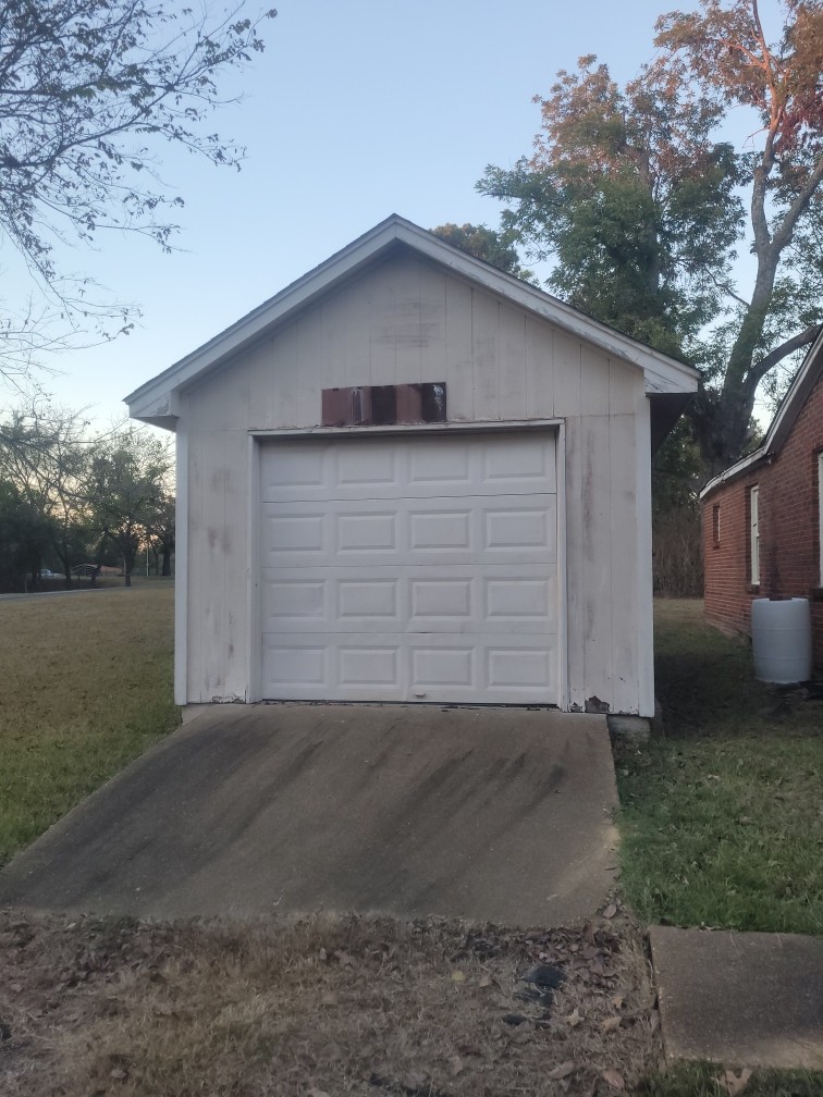 12586 Macon Road Collierville, TN 38017 - Photo 7 of 7 a view of a house with a yard and garage
