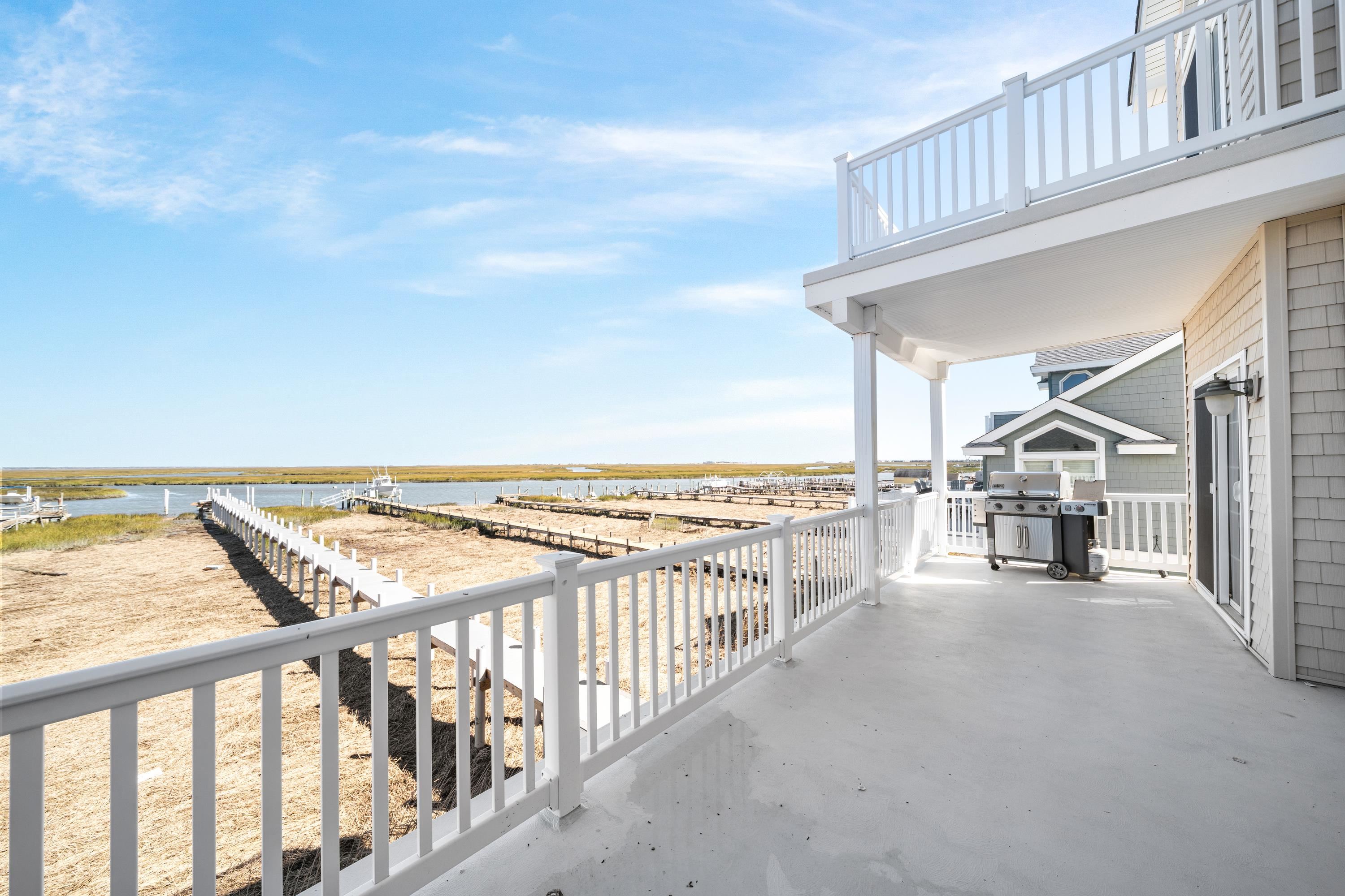 a view of a balcony and an ocean