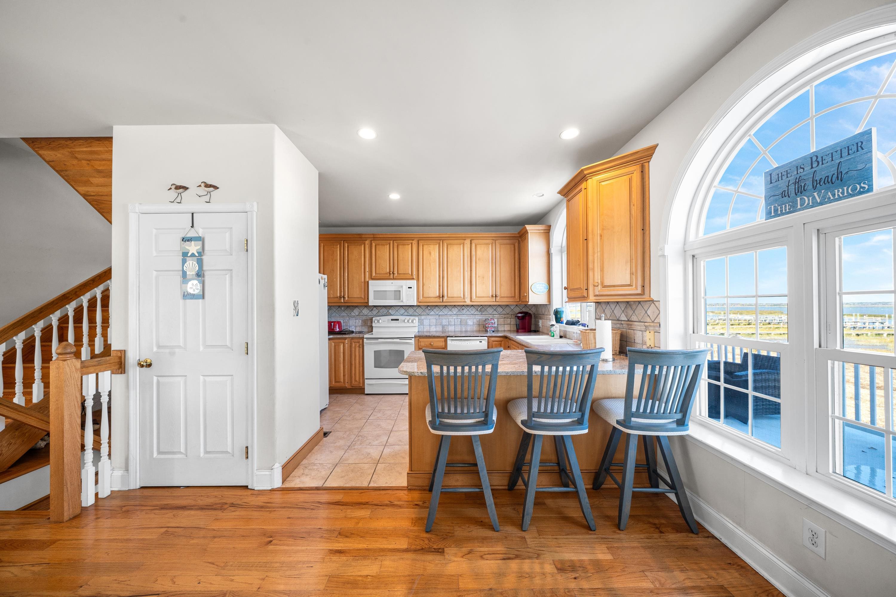 448 Avalon Avalon, NJ 08202 - Photo 2 of 32 a view of a dining room with furniture and windows