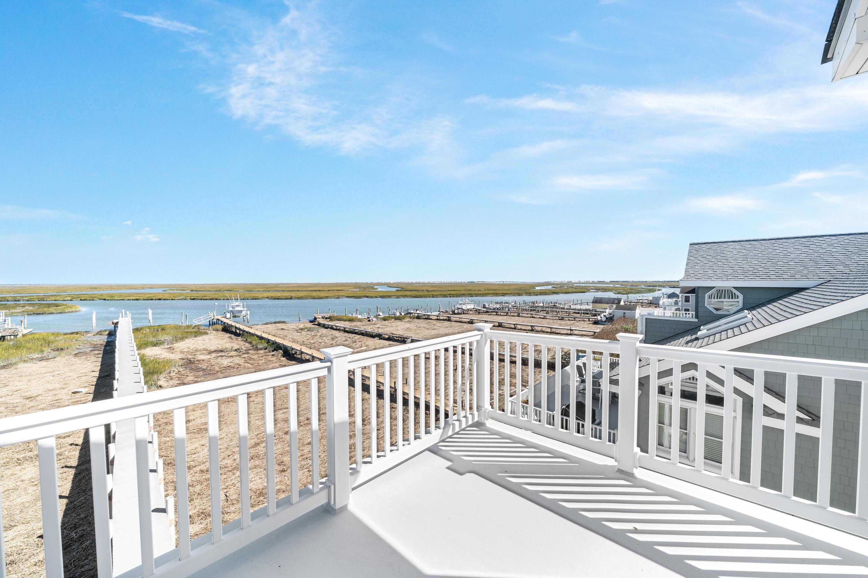 448 Avalon Avalon, NJ 08202 - Photo 9 of 32 a view of a balcony with wooden floor