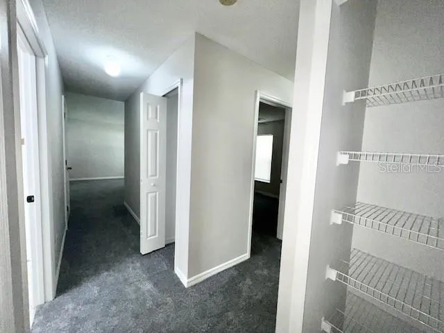 a view of a bathroom with a glass door