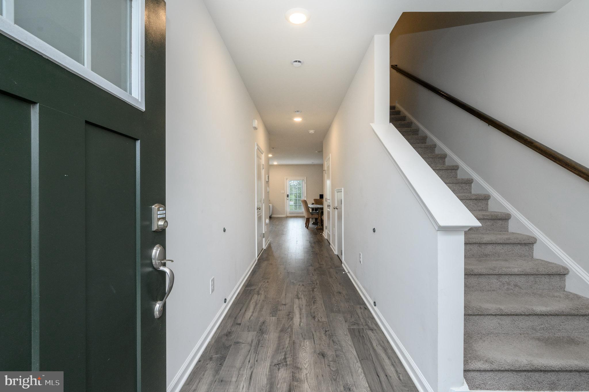 40 Nelsons Way Westampton, NJ 08060 - Photo 4 of 34 a view of a hallway with wooden floor and staircase