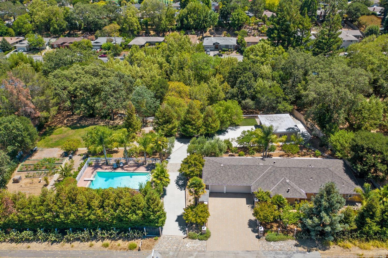 1495 Indian Valley Road Novato, CA 94947 - Photo 1 of 1 an aerial view of a house with a yard
