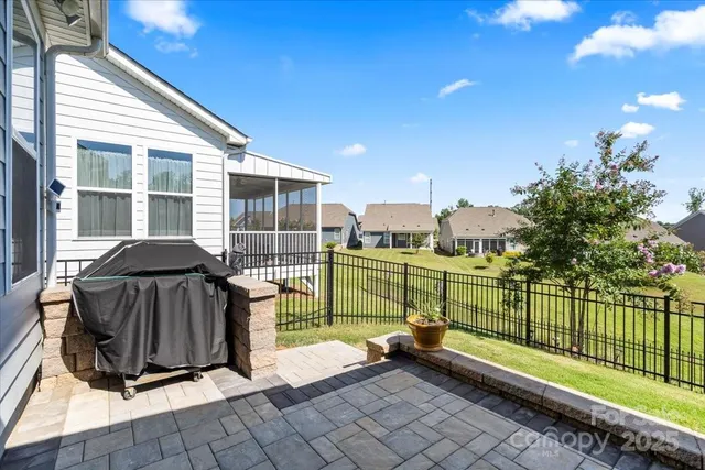 a view of a deck with a backyard