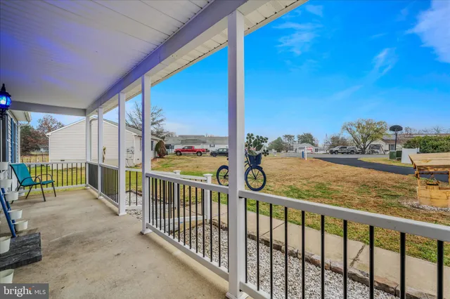 a view of balcony with furniture