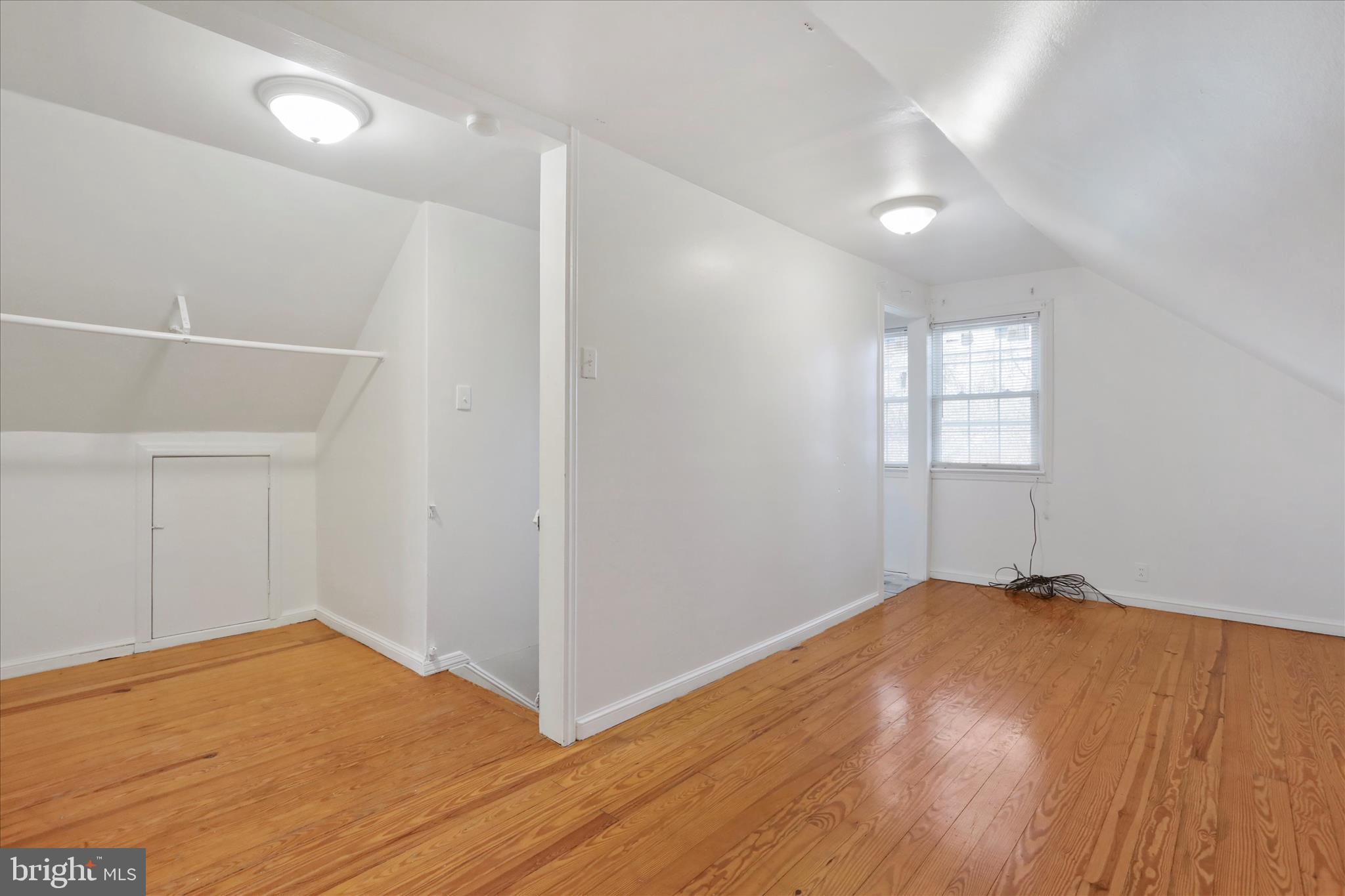 1064 Strasburg Road Front Royal, VA 22630 - Photo 27 of 48 an empty room with wooden floor and windows