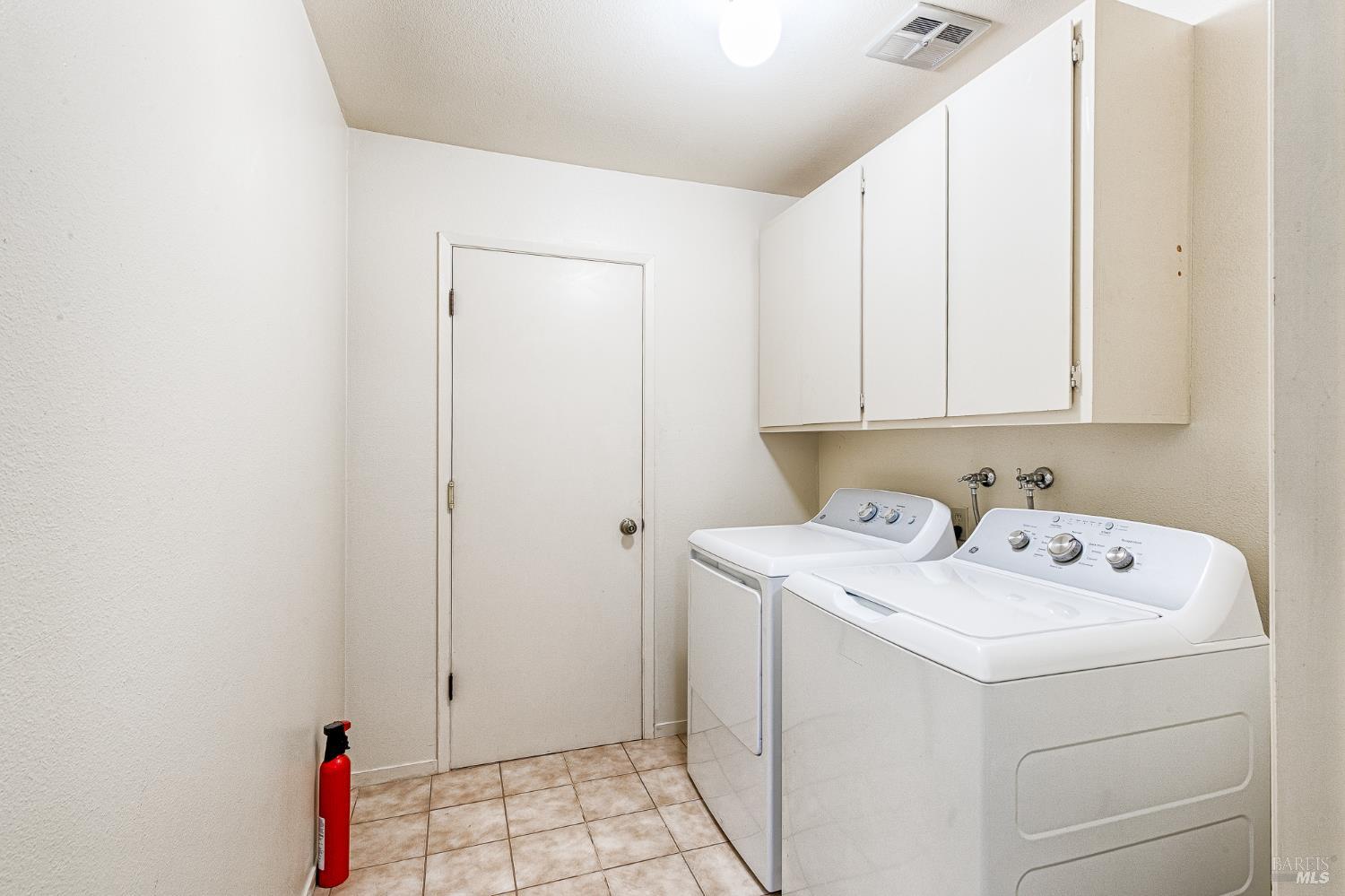 138 Oak Shadow Drive Santa Rosa, CA 95409 - Photo 26 of 50 a utility room with dryer and washer
