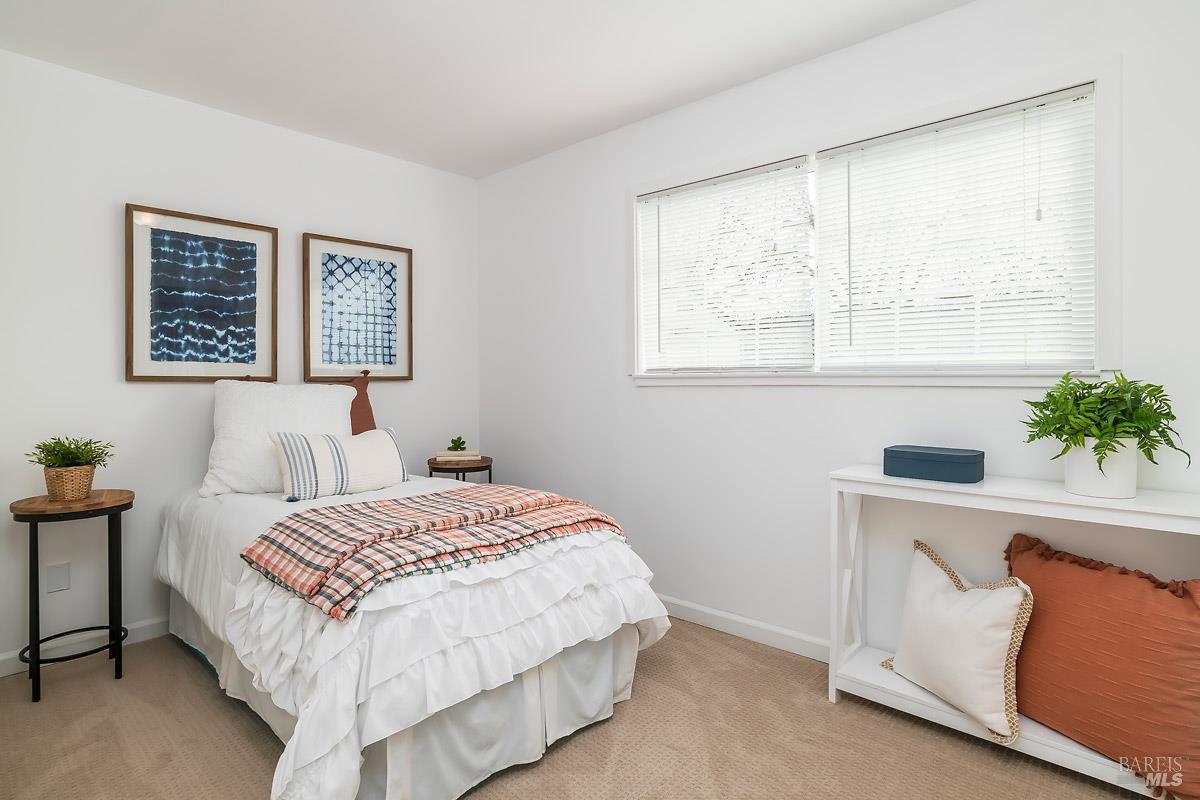 1012 2nd Street Novato, CA 94945 - Photo 18 of 36 3rd bedroom with attached full bathroom (with shower over tub). There's an adjacent bonus room for an office, nursery, exercise space