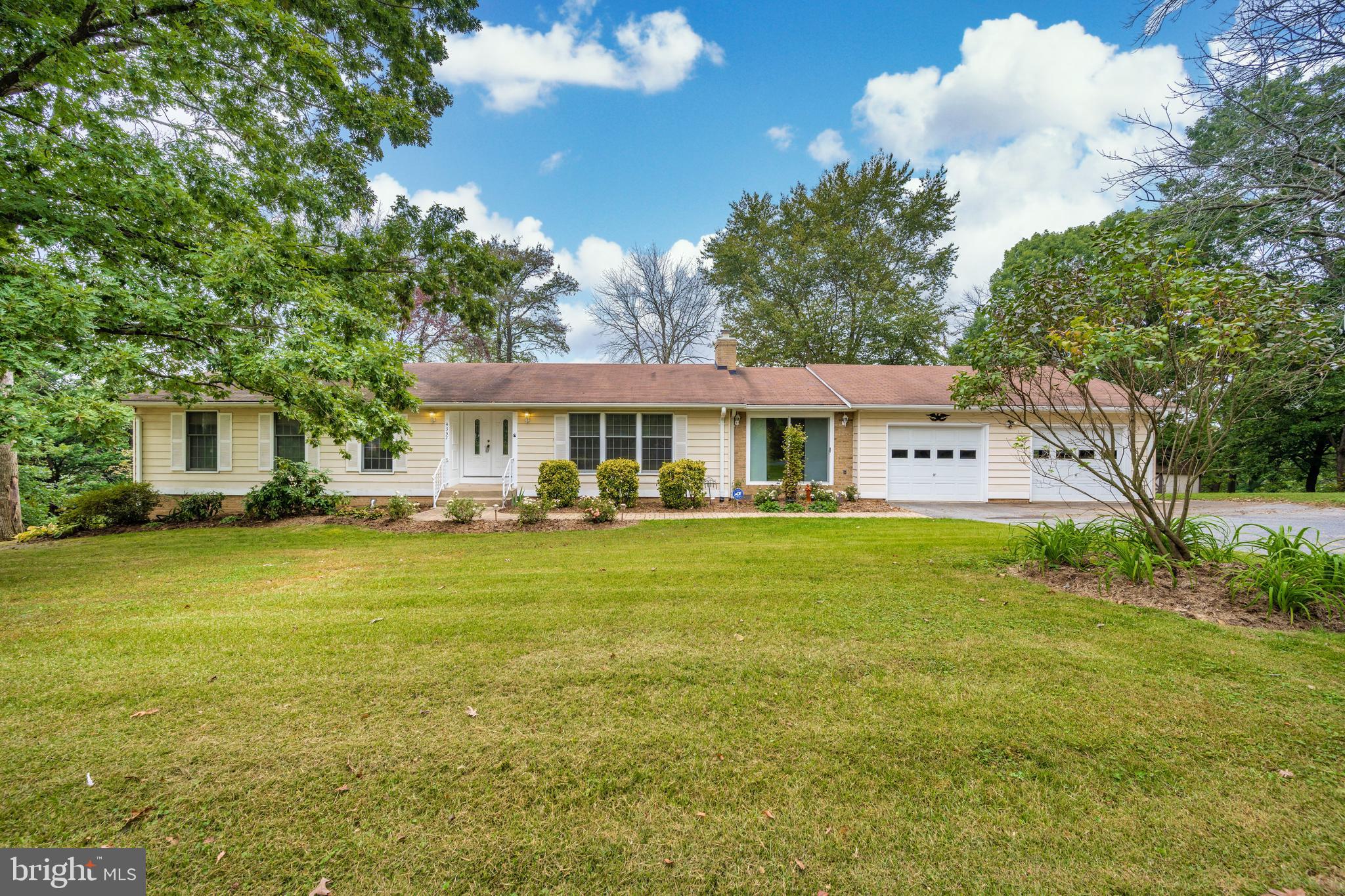 Well maintained rancher on a 1.7 private acre lot