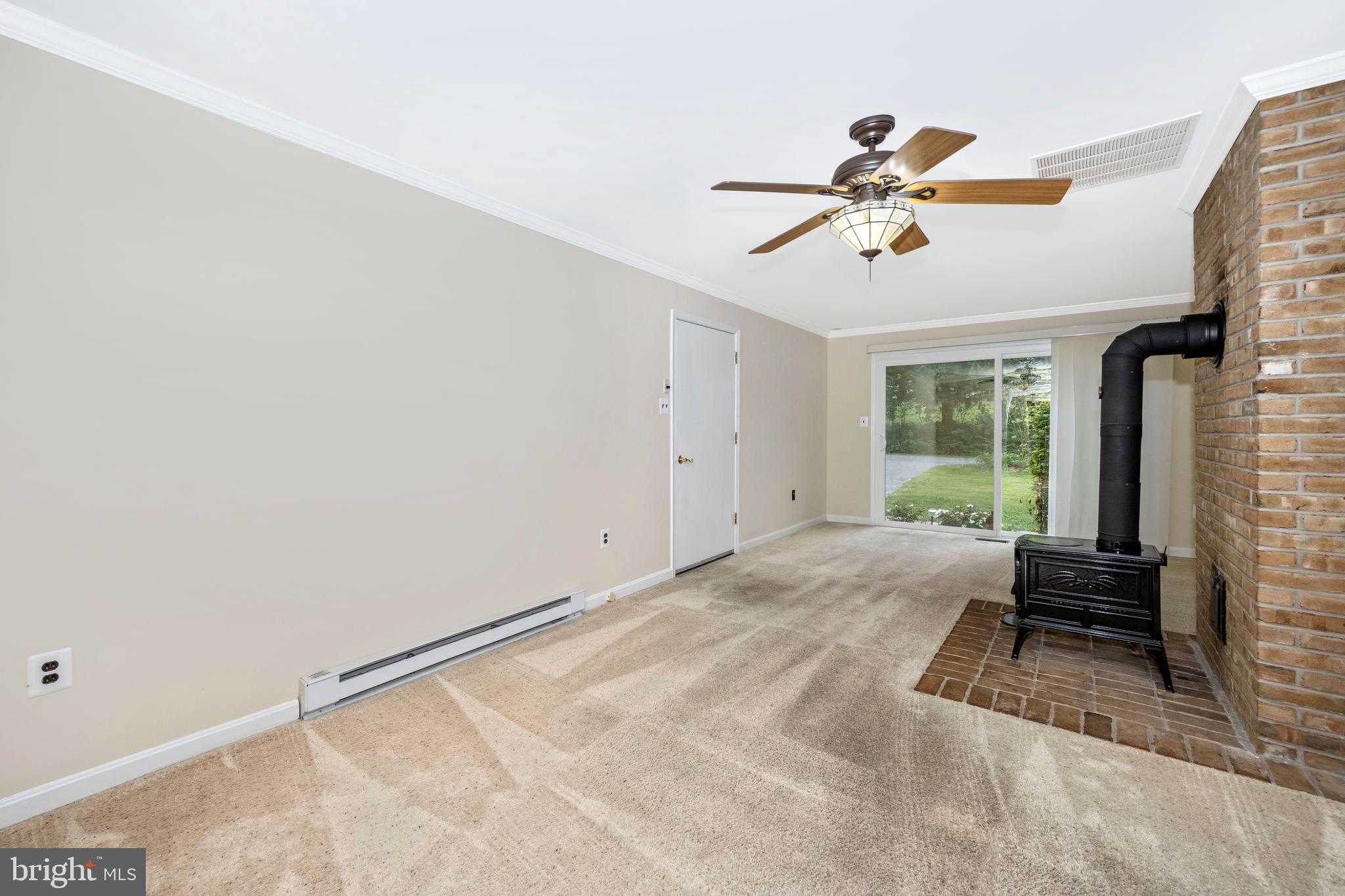 4337 Araby Church Road Frederick, MD 21704 - Photo 23 of 65 Main level family room with a removable woodstove