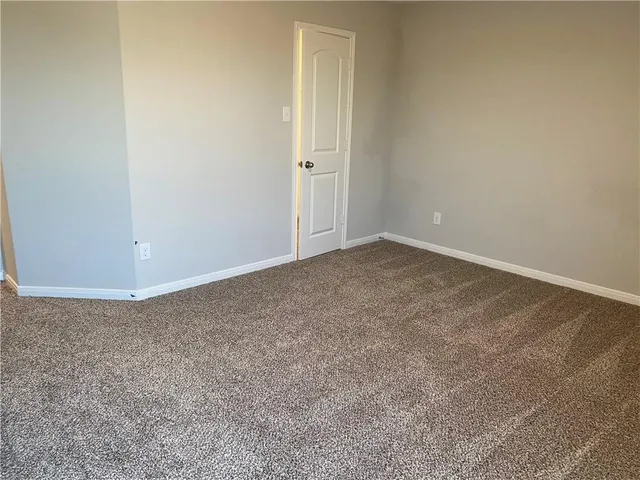 an empty room with an entryway