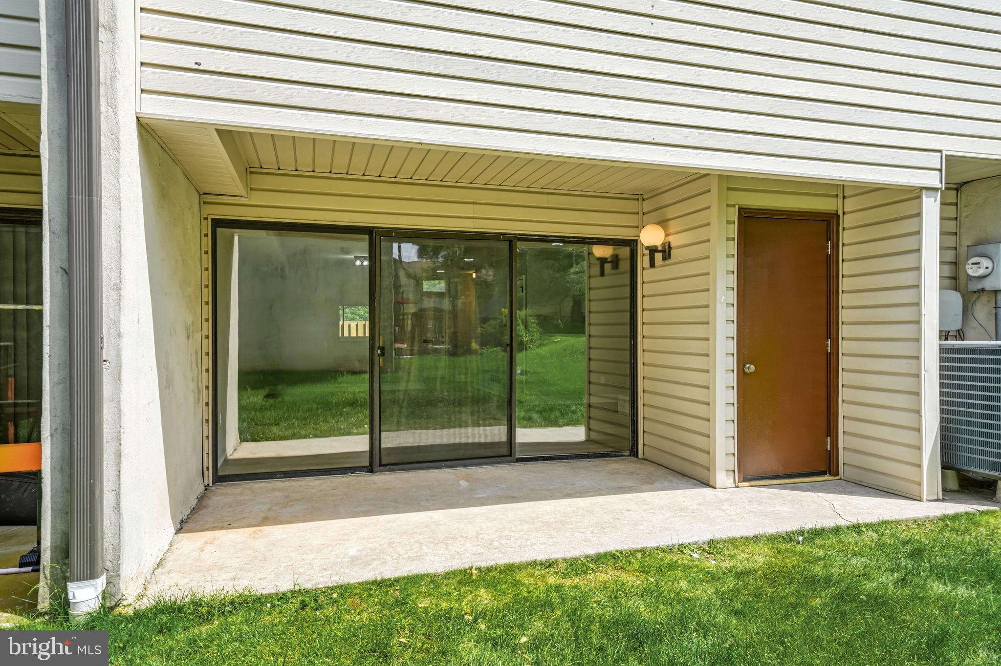 50 Centennial Road Telford, PA 18969 - Photo 18 of 21 Back covered patio with storage closet