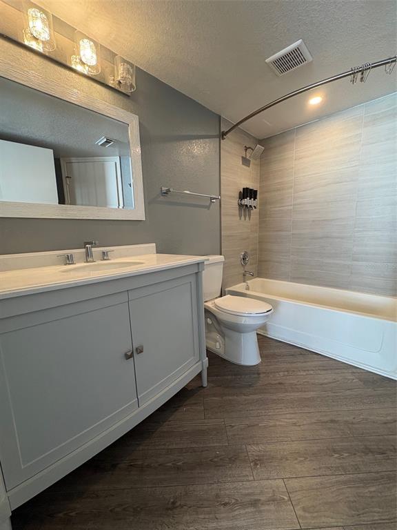 2203 Key W Court, Unit 422 Kissimmee, FL 34741 - Photo 17 of 41 a bathroom with a sink a toilet and shower