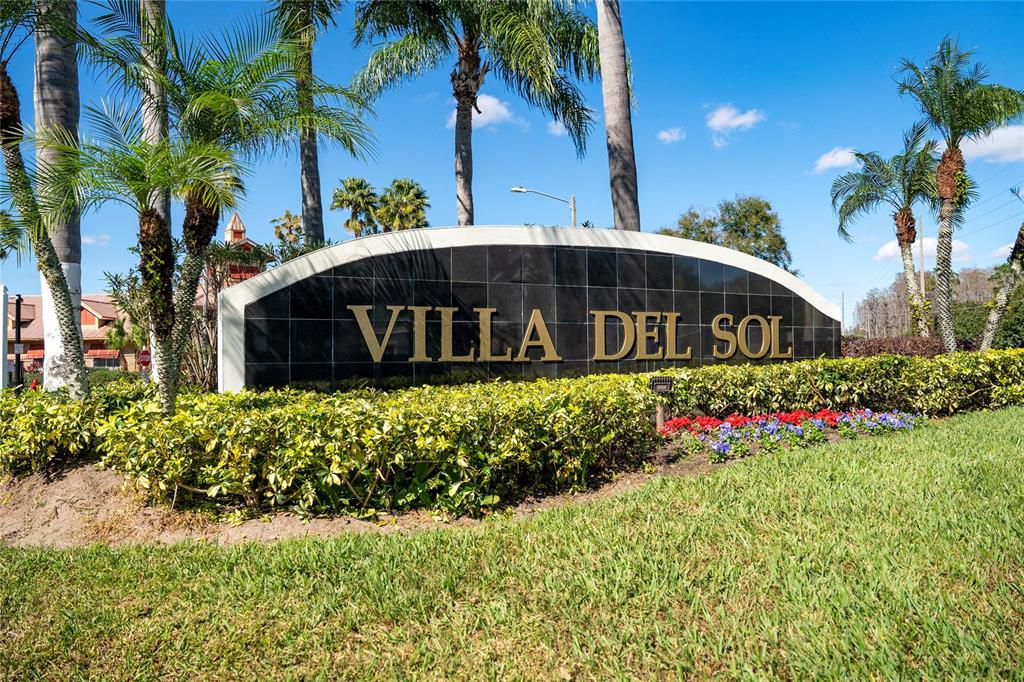 2203 Key W Court, Unit 422 Kissimmee, FL 34741 - Photo 22 of 41 a view of a house with a yard and sitting area