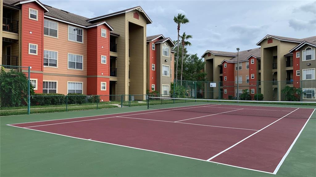 2203 Key W Court, Unit 422 Kissimmee, FL 34741 - Photo 30 of 41 a view of a tennis court