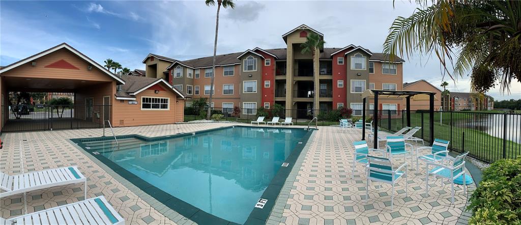 2203 Key W Court, Unit 422 Kissimmee, FL 34741 - Photo 40 of 41 a view of a house with swimming pool