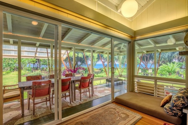 5600 Weke Road Hanalei, HI 96714 - Photo 12 of 25 a bedroom with furniture and a large window