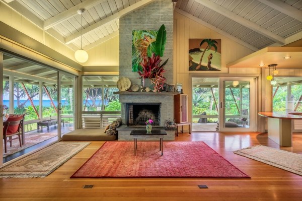5600 Weke Road Hanalei, HI 96714 - Photo 2 of 25 a living room with fireplace furniture and a floor to ceiling window