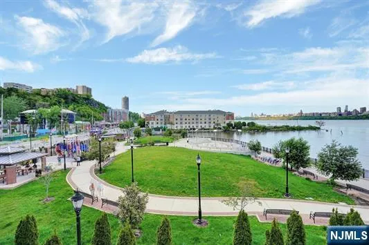 a garden view with a lake view
