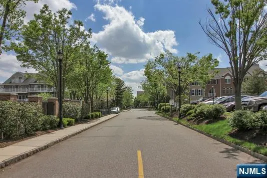 a view of a road with a building in the background