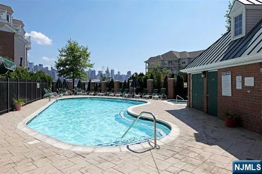 a view of a backyard with sitting area