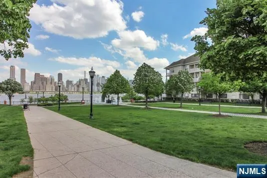 a view of a park and trees