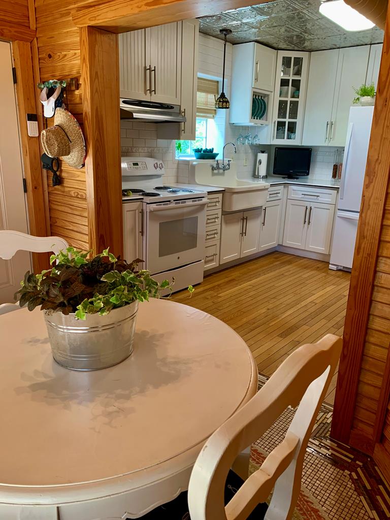 105 Fir Road Fredericksburg, TX 78624 - Photo 8 of 30 Dining Rm to Kitchen