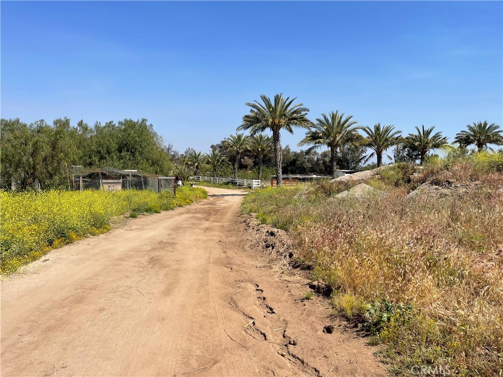 22285 Old Elsinore Road Perris, CA 92570 - Photo 3 of 16 a view of a lake with a yard