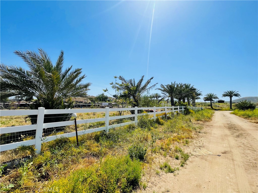 22285 Old Elsinore Road Perris, CA 92570 - Photo 4 of 16 a view of a swimming pool and lounge chairs
