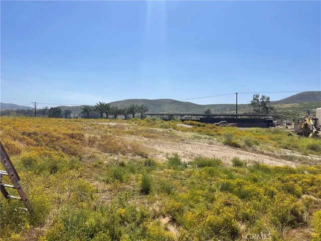 a view of a swimming pool with an ocean view