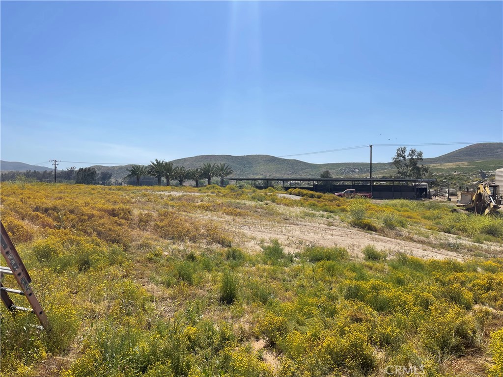 22285 Old Elsinore Road Perris, CA 92570 - Photo 9 of 16 a view of a lake with houses in the background