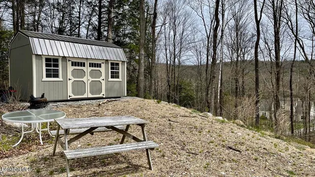 a house with trees in front of it