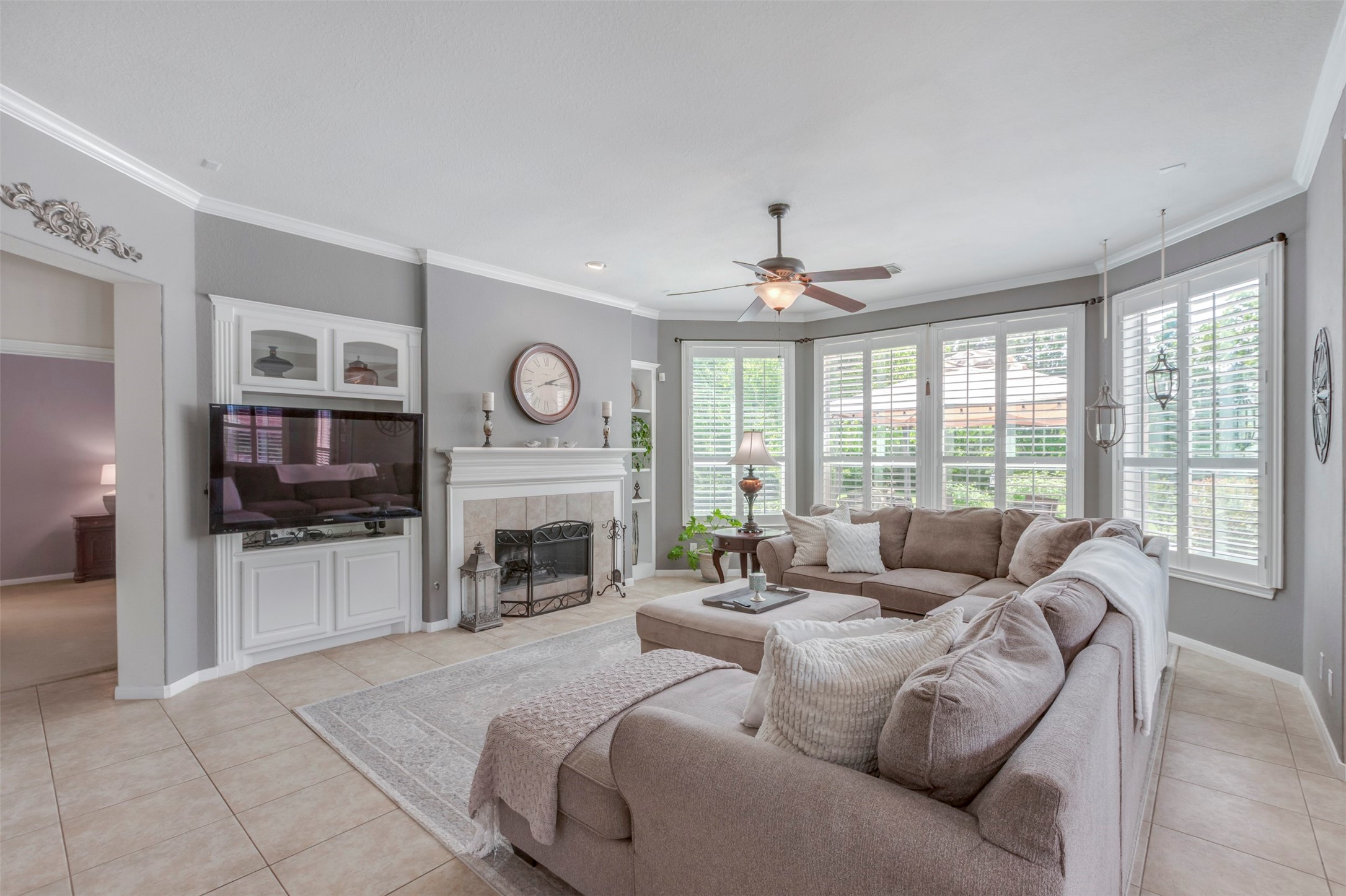 1120 Silveridge Conroe, TX 77304 - Photo 11 of 39 a living room with furniture fireplace and flat screen tv
