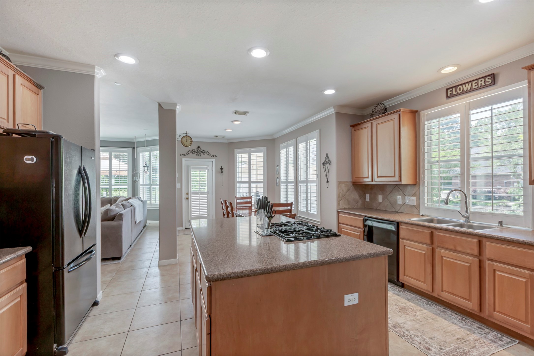 1120 Silveridge Conroe, TX 77304 - Photo 16 of 39 a kitchen with counter top space cabinets and stainless steel appliances