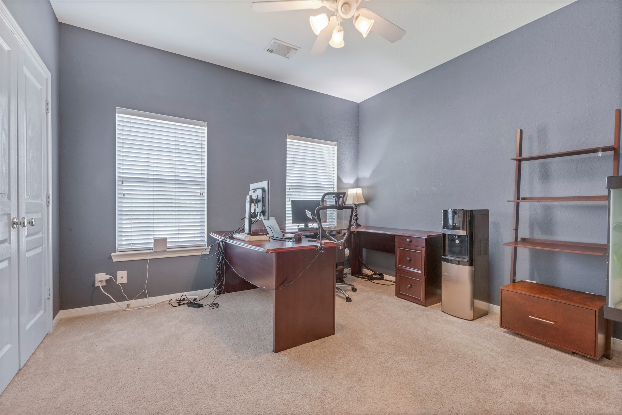 1120 Silveridge Conroe, TX 77304 - Photo 29 of 39 a living room with furniture and a window