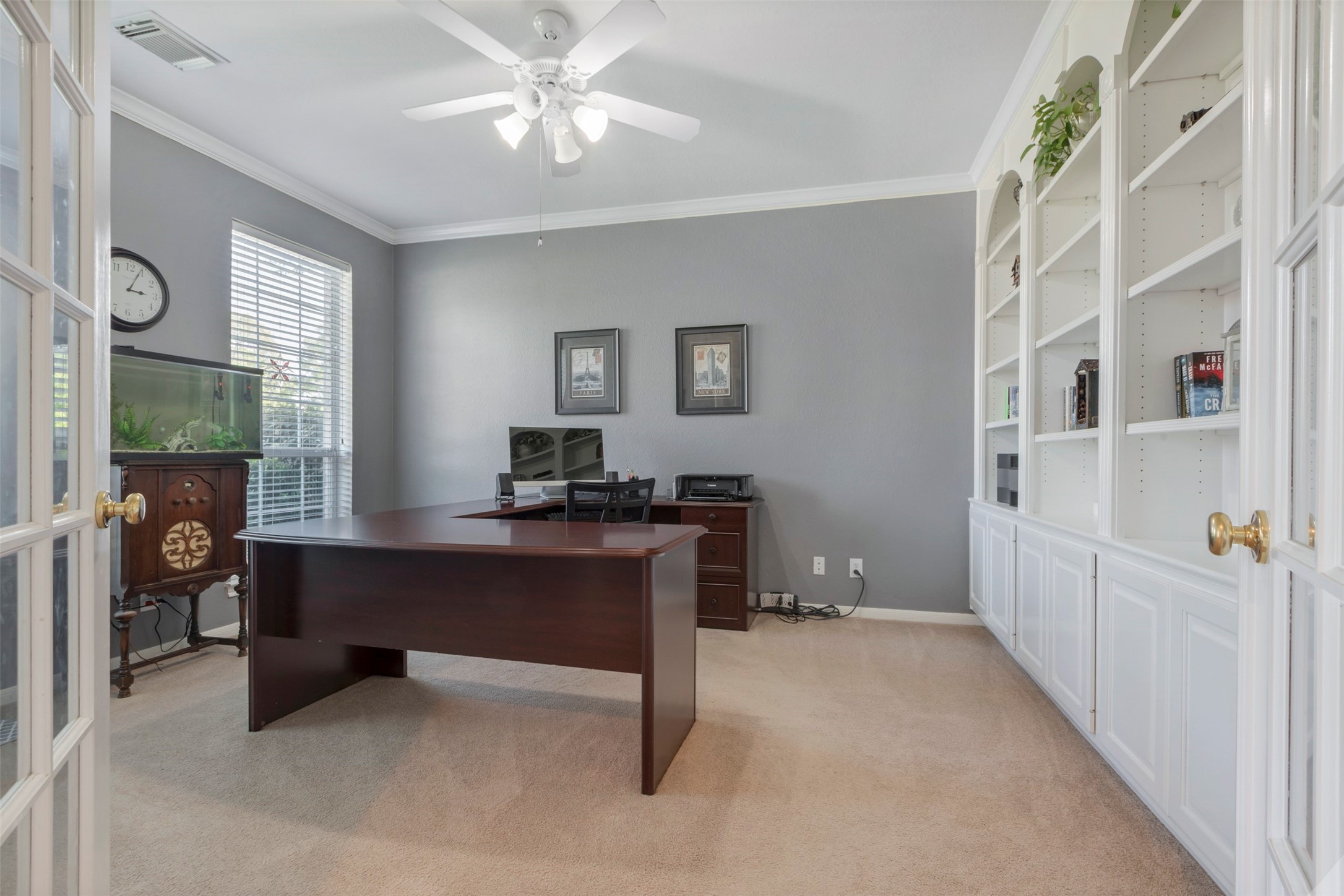 1120 Silveridge Conroe, TX 77304 - Photo 8 of 39 a view of a workspace with furniture and a window