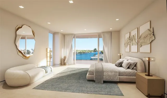 a spacious bedroom with a bed a couch and a large window