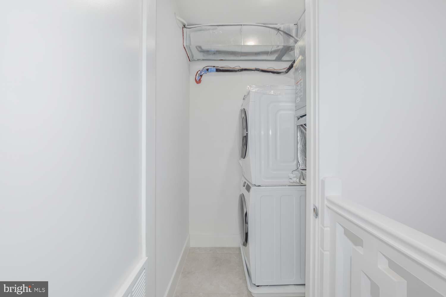 4328 Georgia Avenue Northwest, Unit 401 Washington, DC 20011 - Photo 27 of 32 a bathroom with a glass shower door