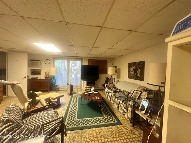 a view of a livingroom with furniture