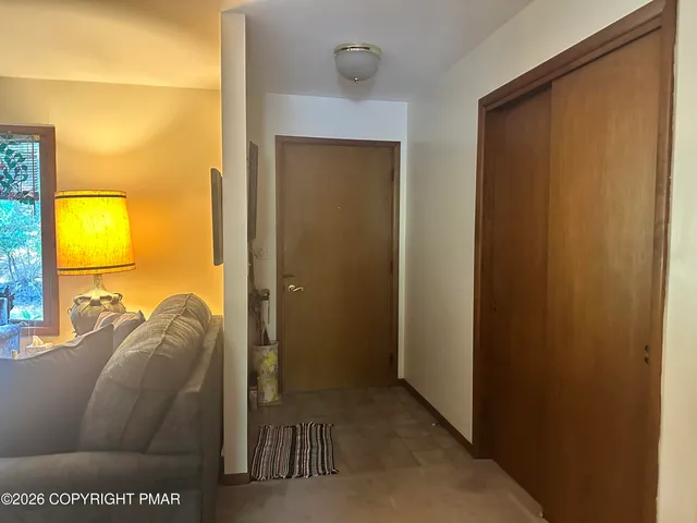 a living room with a couch and a table