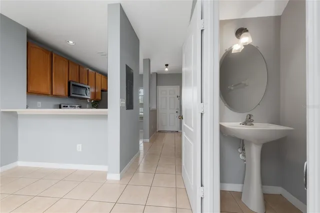 a view of a kitchen from the hallway